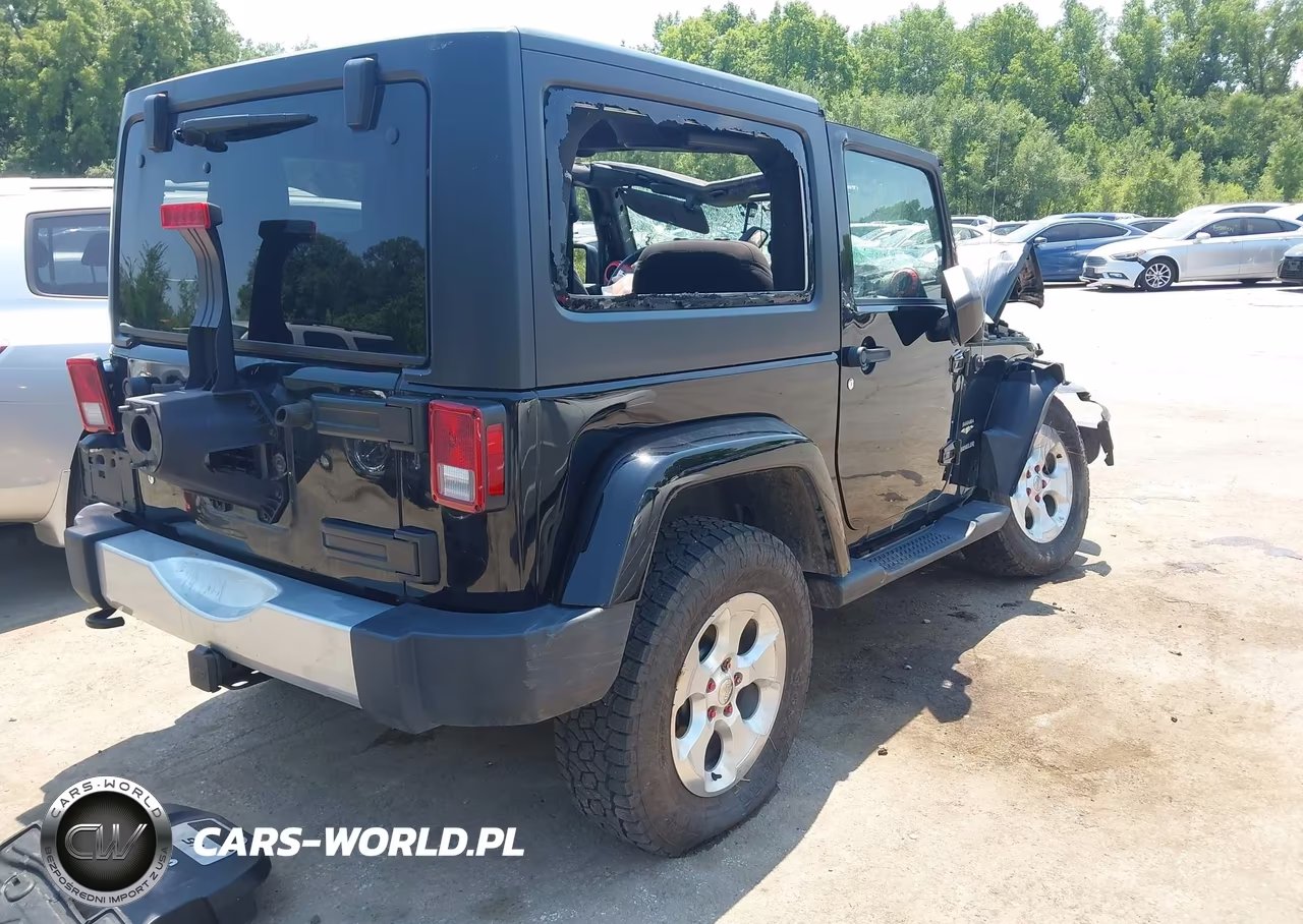 2015 Jeep Wrangler Sahara VIN:1C4AJWBG8FL735962 - 4