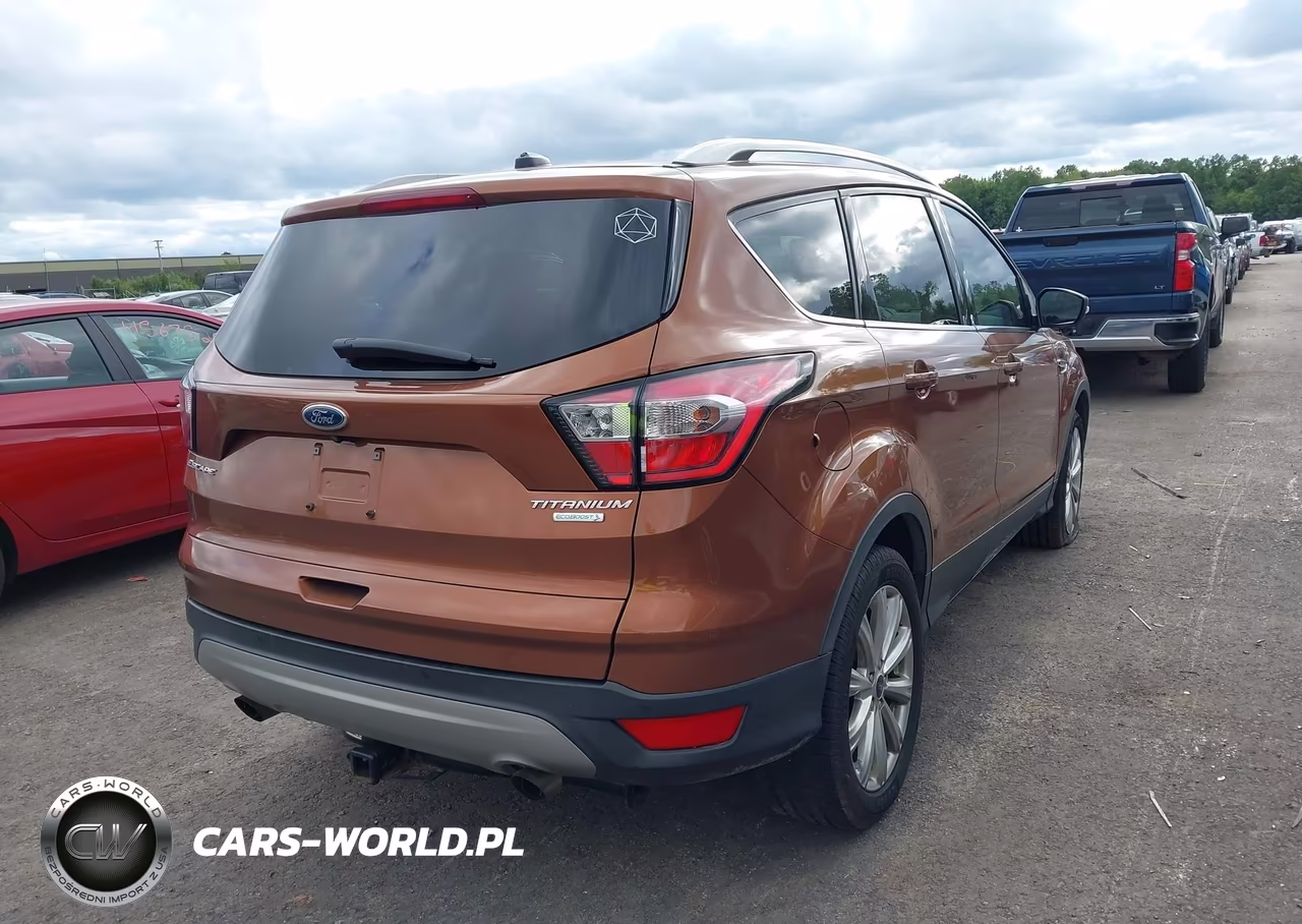 2017 Ford Escape Titanium VIN:1FMCU0JD4HUE33260 - 4