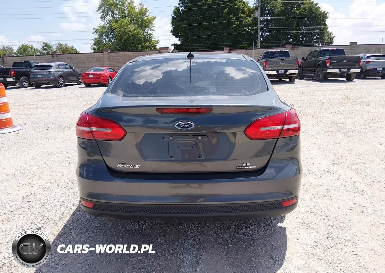 2016 Ford Focus Se VIN:1FADP3F20GL328878 - 16
