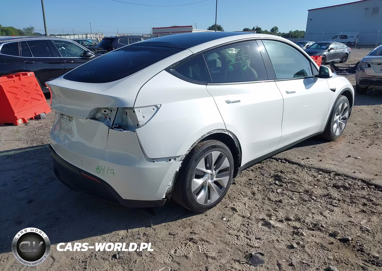 2023 Tesla Model Y Rwd VIN:7SAYGDED7PF932311 - 4