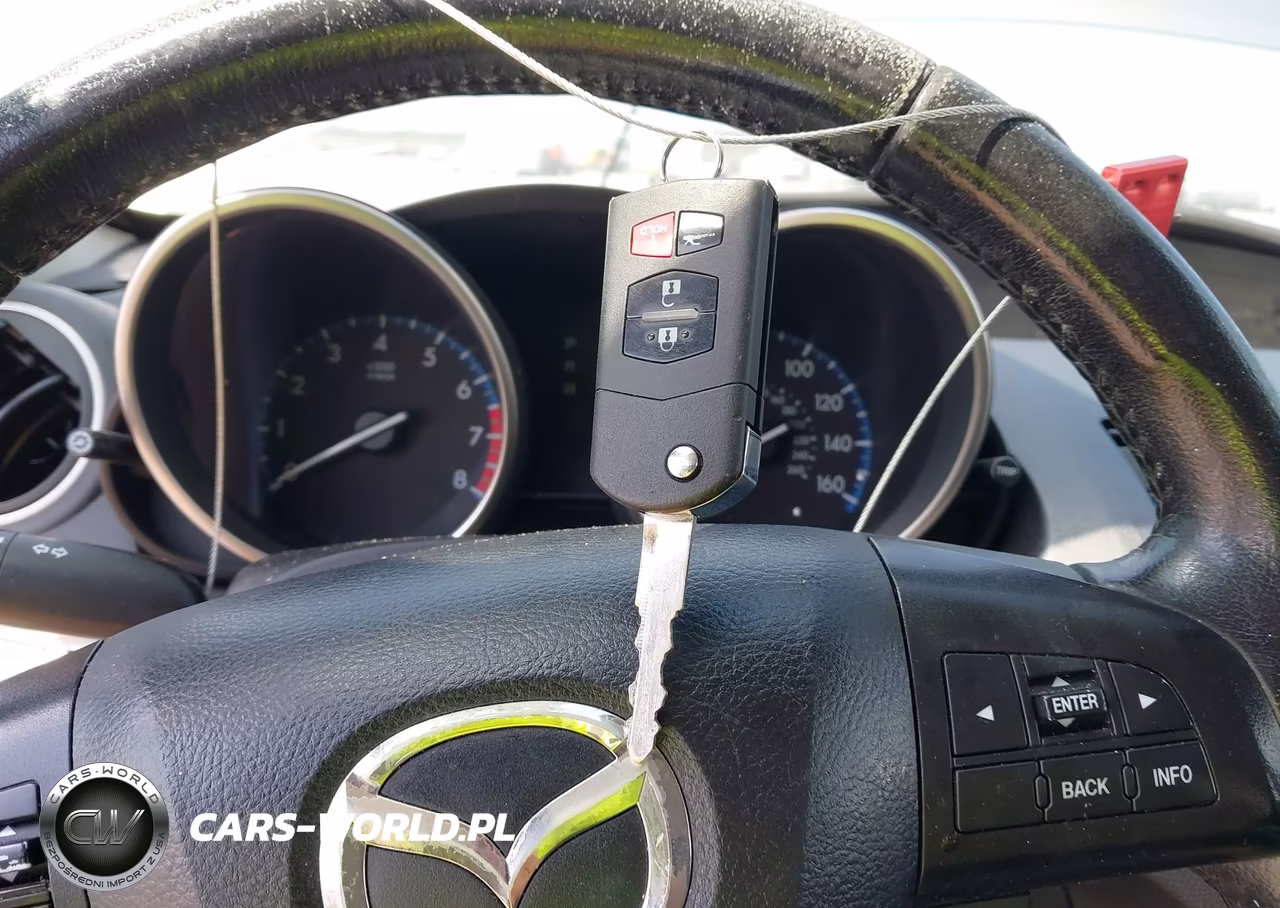 2012 Mazda Mazda3 I Touring VIN:JM1BL1V82C1609285 - 11