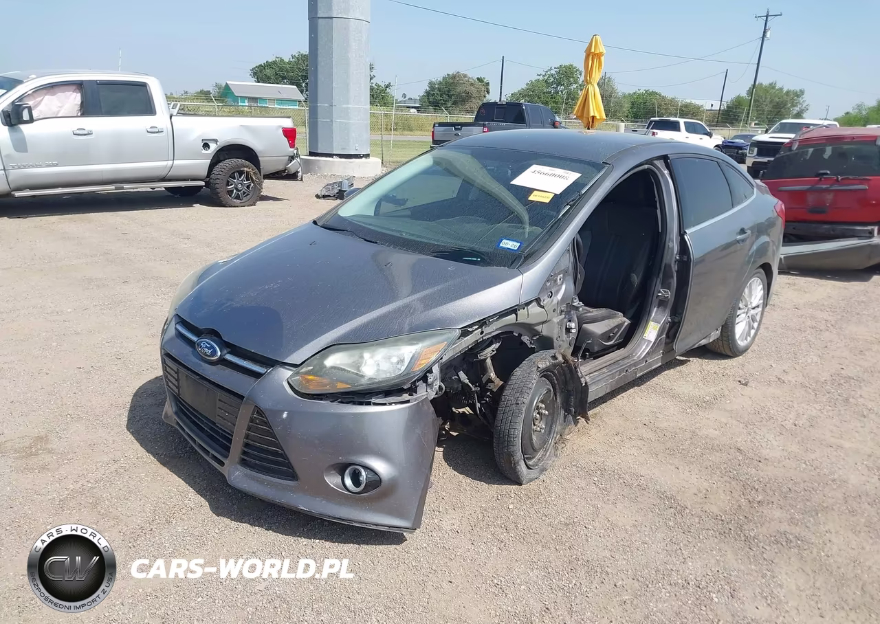 2014 Ford Focus Titanium VIN:1FADP3J25EL195880 - 2