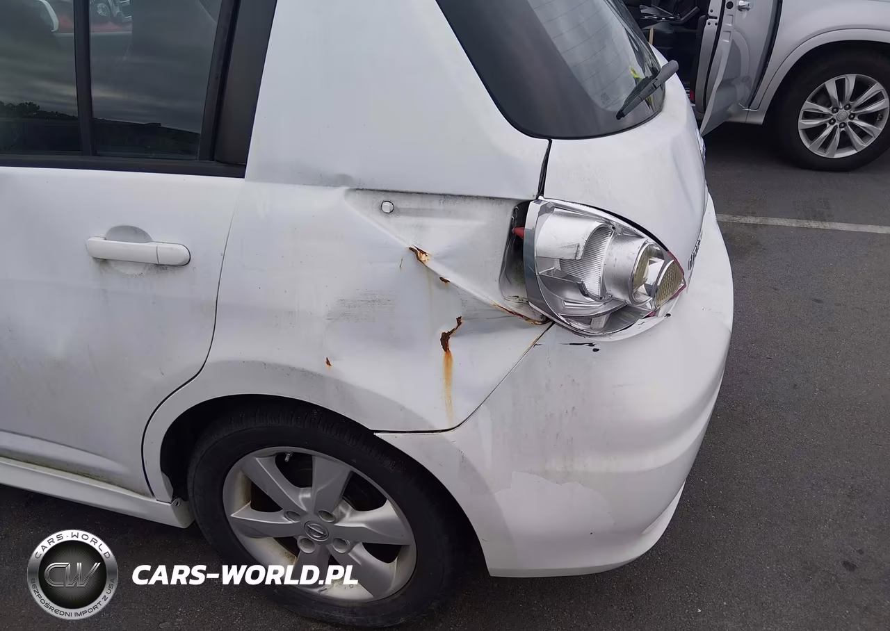 2011 Nissan Versa 1.8Sl VIN:3N1BC1CP2BL491002 - 12