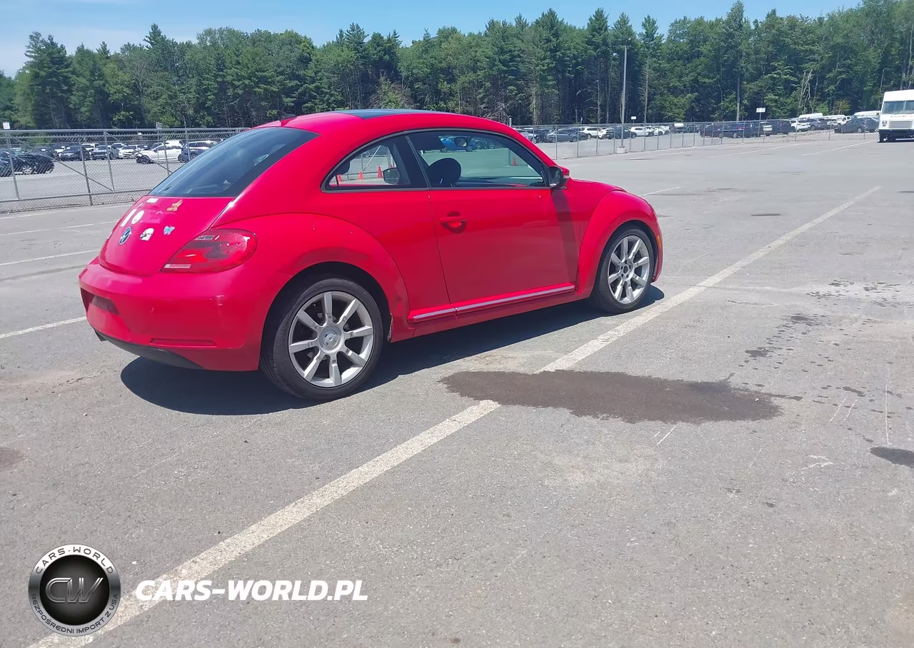 2014 Volkswagen Beetle 2.5L VIN:3VWHP7AT8EM631063 - 4