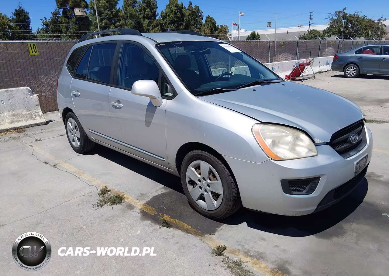 2009 Kia Rondo Lx VIN:KNAFG528097266299 - 1