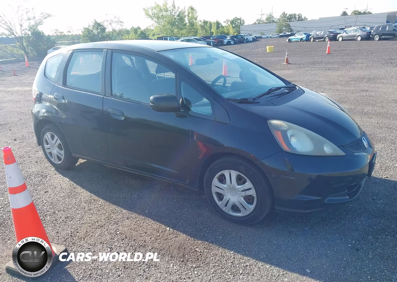 2009 Honda Fit VIN:JHMGE87249S040846 - 1