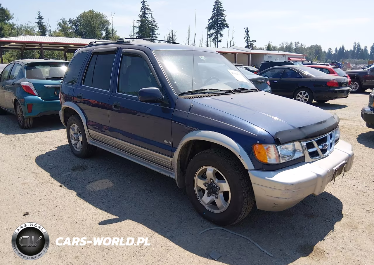 2000 Kia Sportage Ex VIN:KNDJA7239Y5665818 - 1