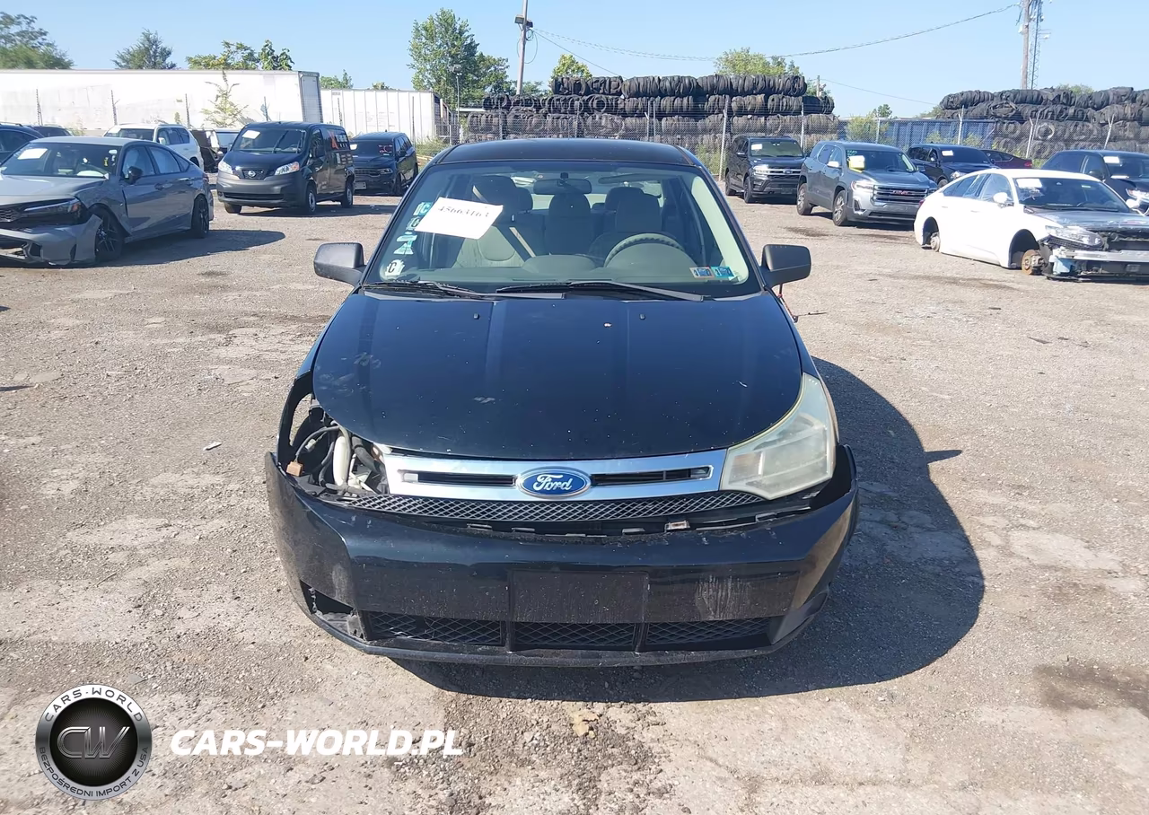 2009 Ford Focus Se VIN:1FAHP35N39W140645 - 12