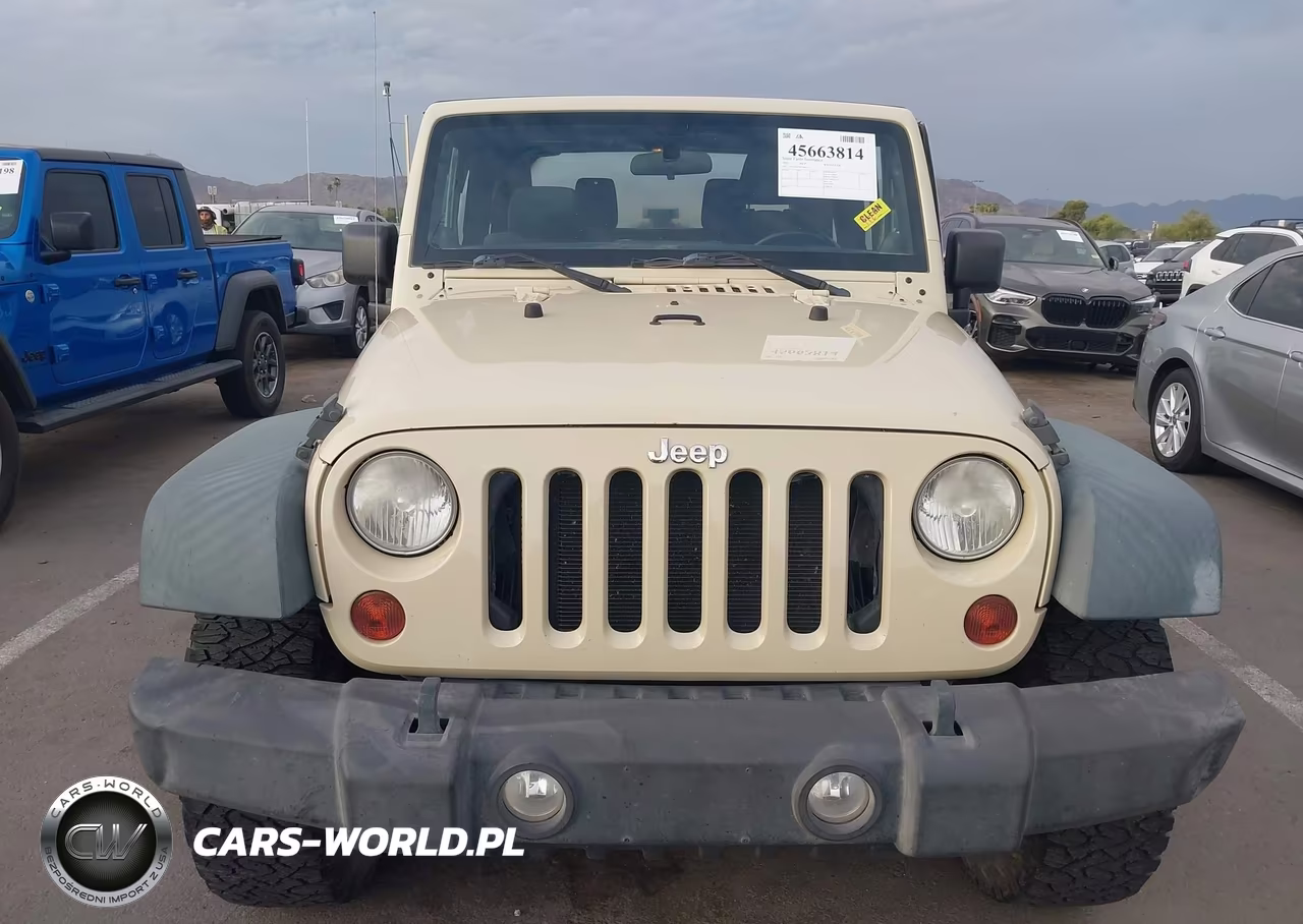 2011 Jeep Wrangler Sport VIN:1J4AA2D15BL566571 - 12