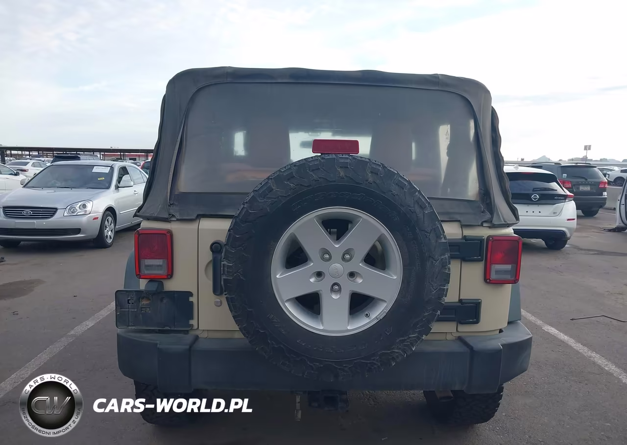 2011 Jeep Wrangler Sport VIN:1J4AA2D15BL566571 - 16