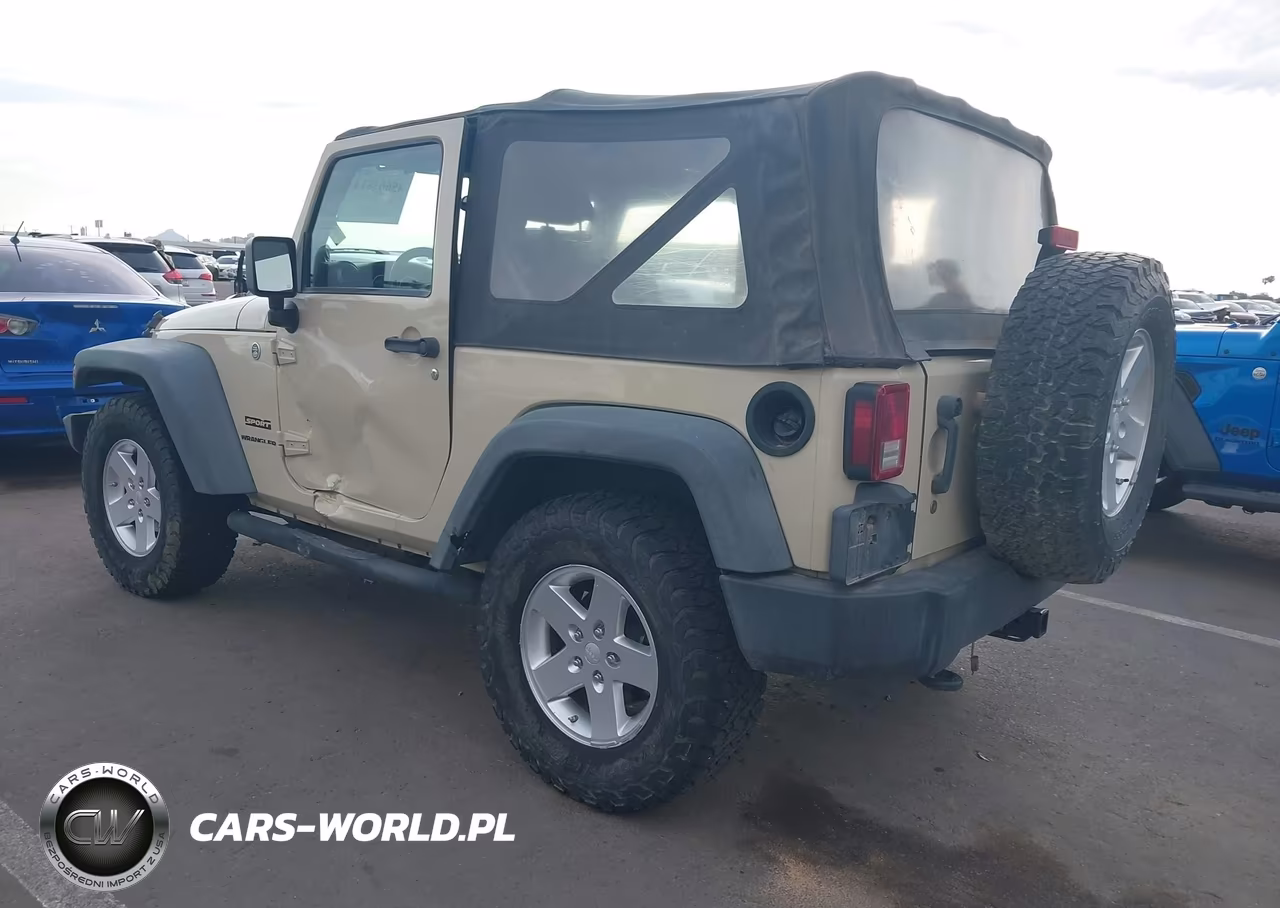 2011 Jeep Wrangler Sport VIN:1J4AA2D15BL566571 - 3
