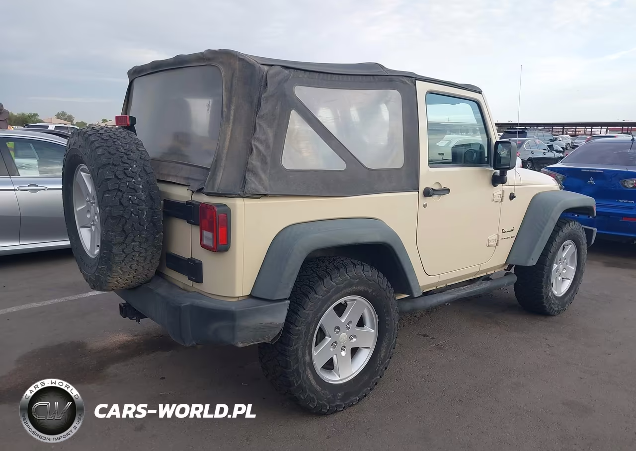 2011 Jeep Wrangler Sport VIN:1J4AA2D15BL566571 - 4