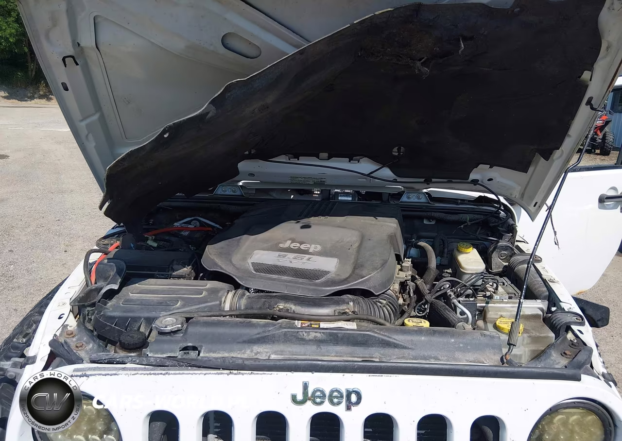 2013 Jeep Wrangler Sahara VIN:1C4AJWBG9DL602902 - 10