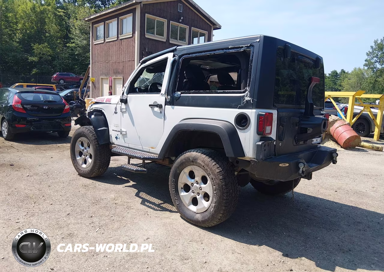 2013 Jeep Wrangler Sahara VIN:1C4AJWBG9DL602902 - 3
