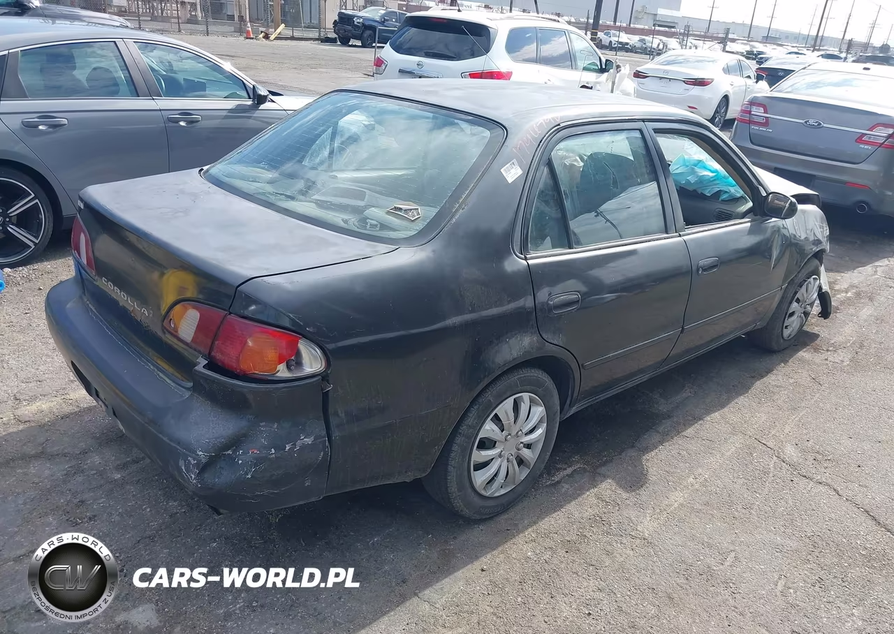 1999 Toyota Corolla Le VIN:1NXBR12E8XZ298941 - 4