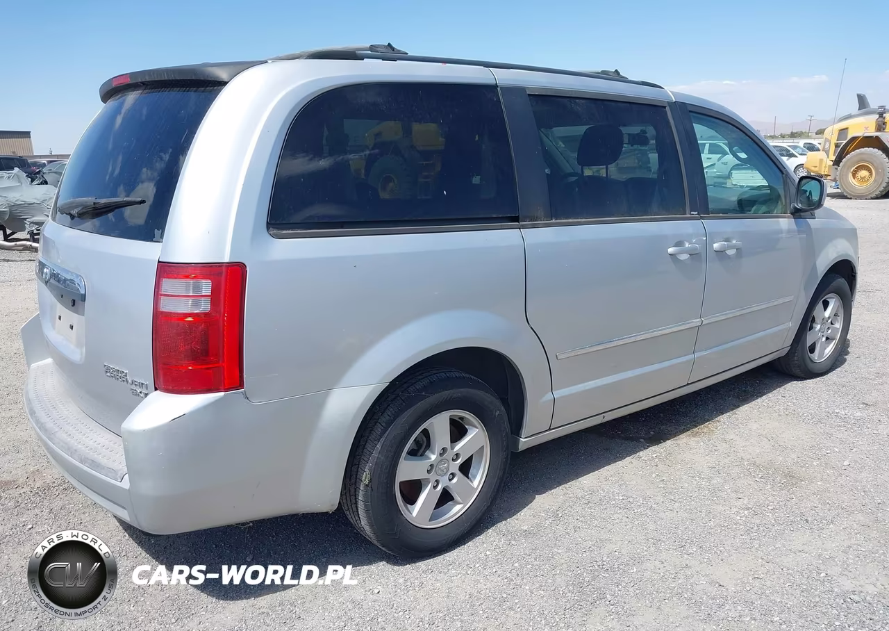 2010 Dodge Grand Caravan Sxt VIN:2D4RN5D12AR209582 - 4