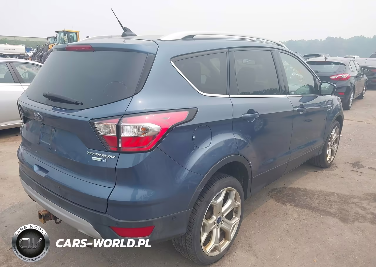 2018 Ford Escape Titanium VIN:1FMCU9J96JUB59582 - 4