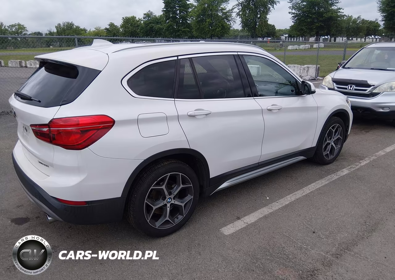 2018 BMW X1 xDrive28I VIN:WBXHT3C38J5L30512 - 4