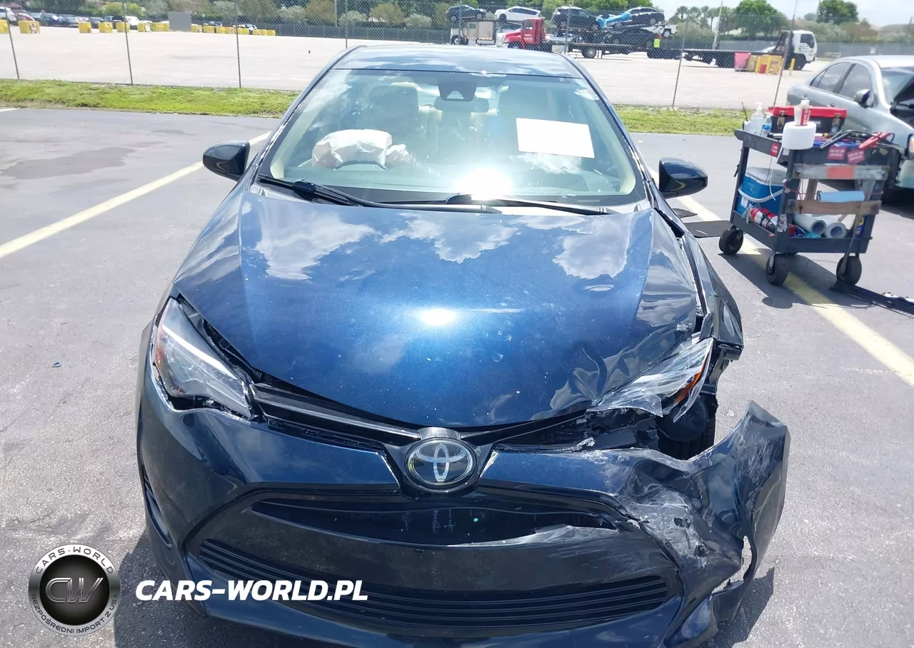 2018 Toyota Corolla Le VIN:5YFBURHE3JP771741 - 12