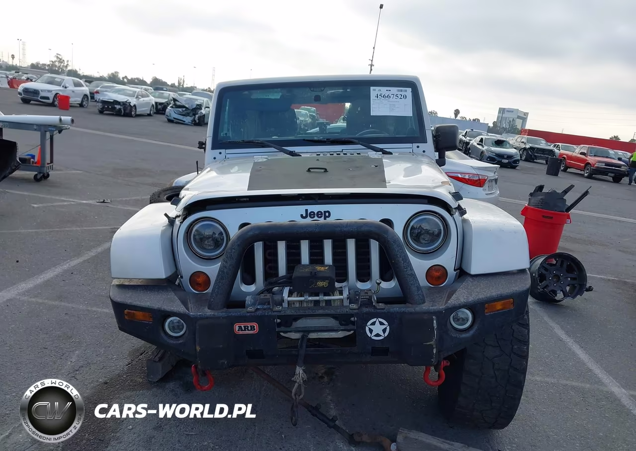 2011 Jeep Wrangler Unlimited Sahara VIN:1J4HA5H1XBL551400 - 13