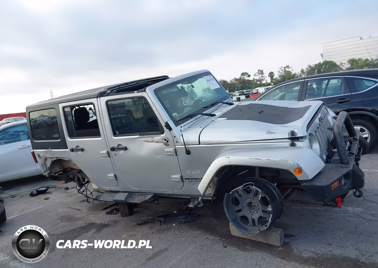 2011 Jeep Wrangler Unlimited Sahara VIN:1J4HA5H1XBL551400 - 14