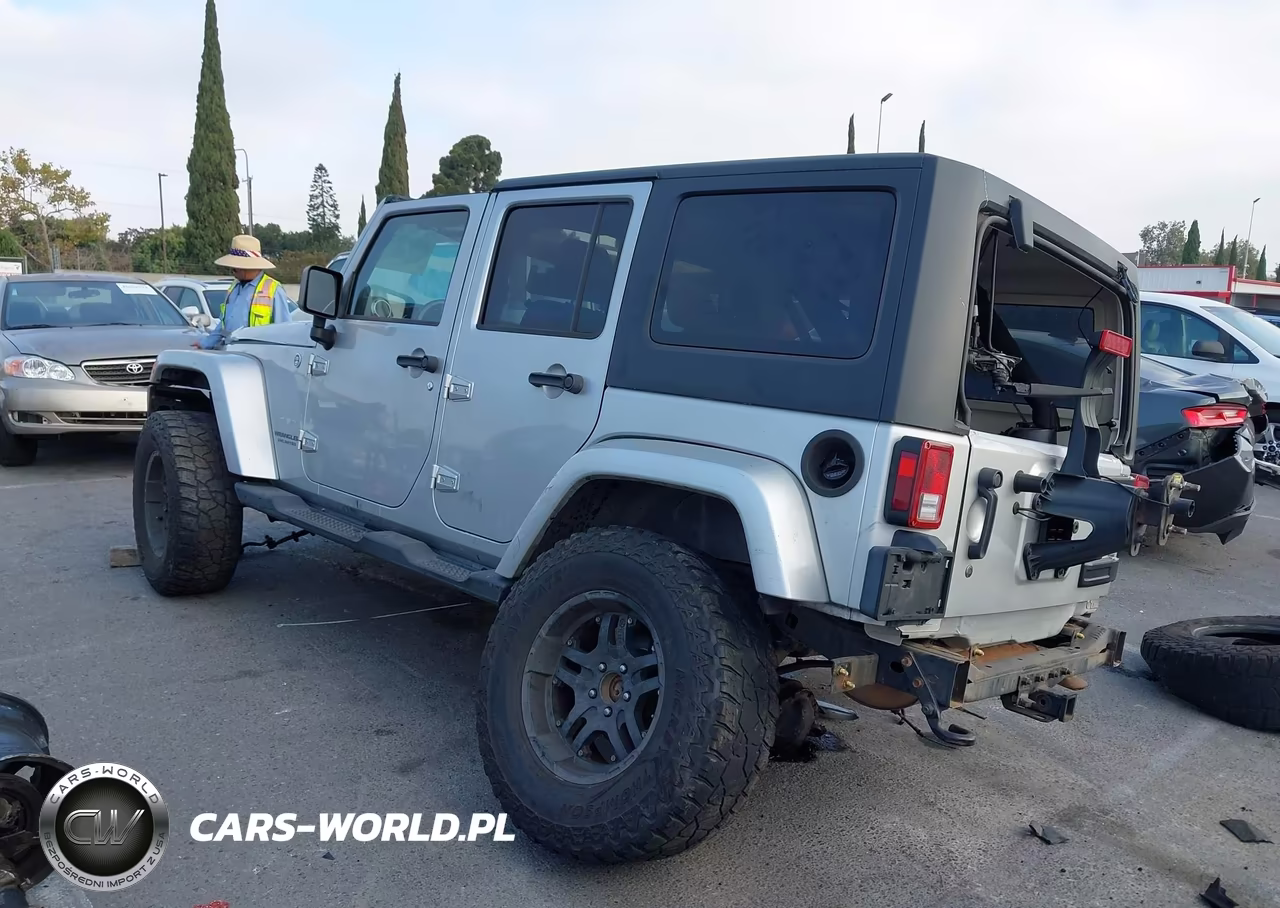 2011 Jeep Wrangler Unlimited Sahara VIN:1J4HA5H1XBL551400 - 3