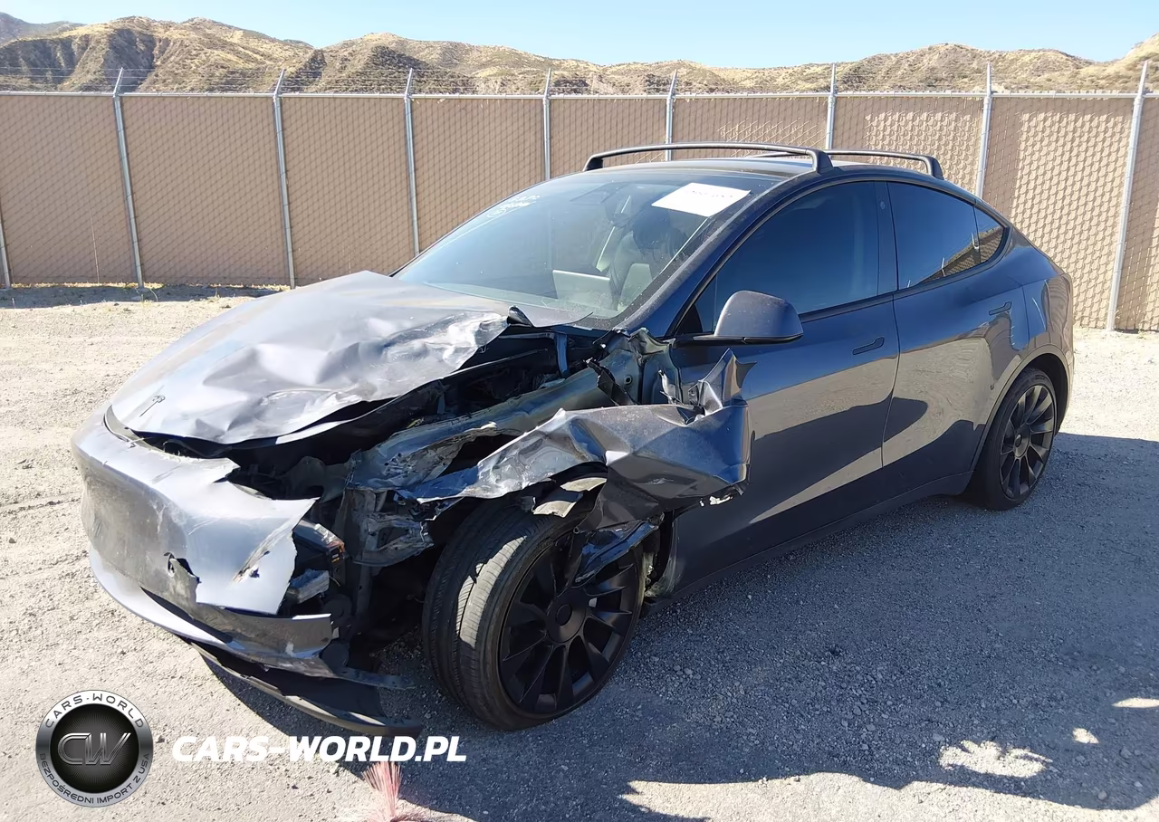 2023 Tesla Model Y Awd-Long Range Dual Motor All-Wheel Drive VIN:7SAYGAEEXPF620474 - 2