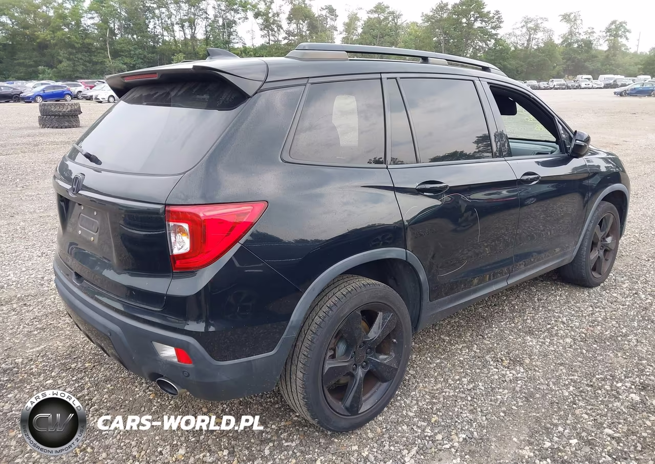 2019 Honda Passport Elite VIN:5FNYF8H0XKB002508 - 4