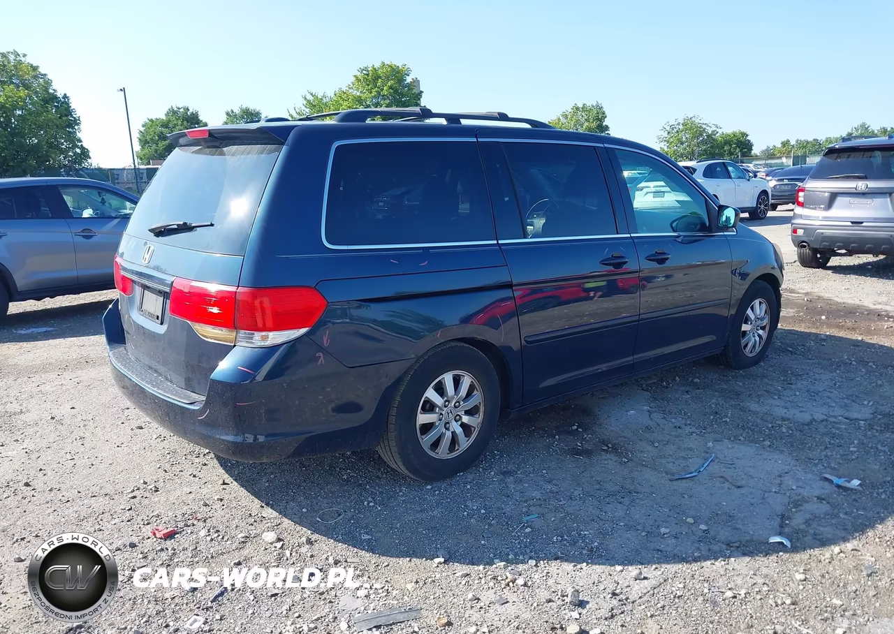 2010 Honda Odyssey Ex-L VIN:5FNRL3H74AB107668 - 4