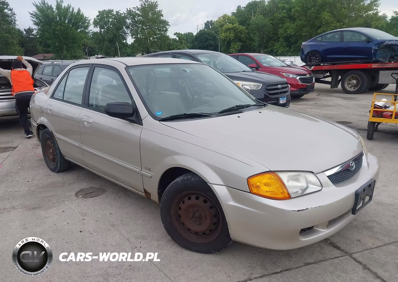 2000 Mazda Protege Dx-Lx VIN:JM1BJ222XY0294440 - 1