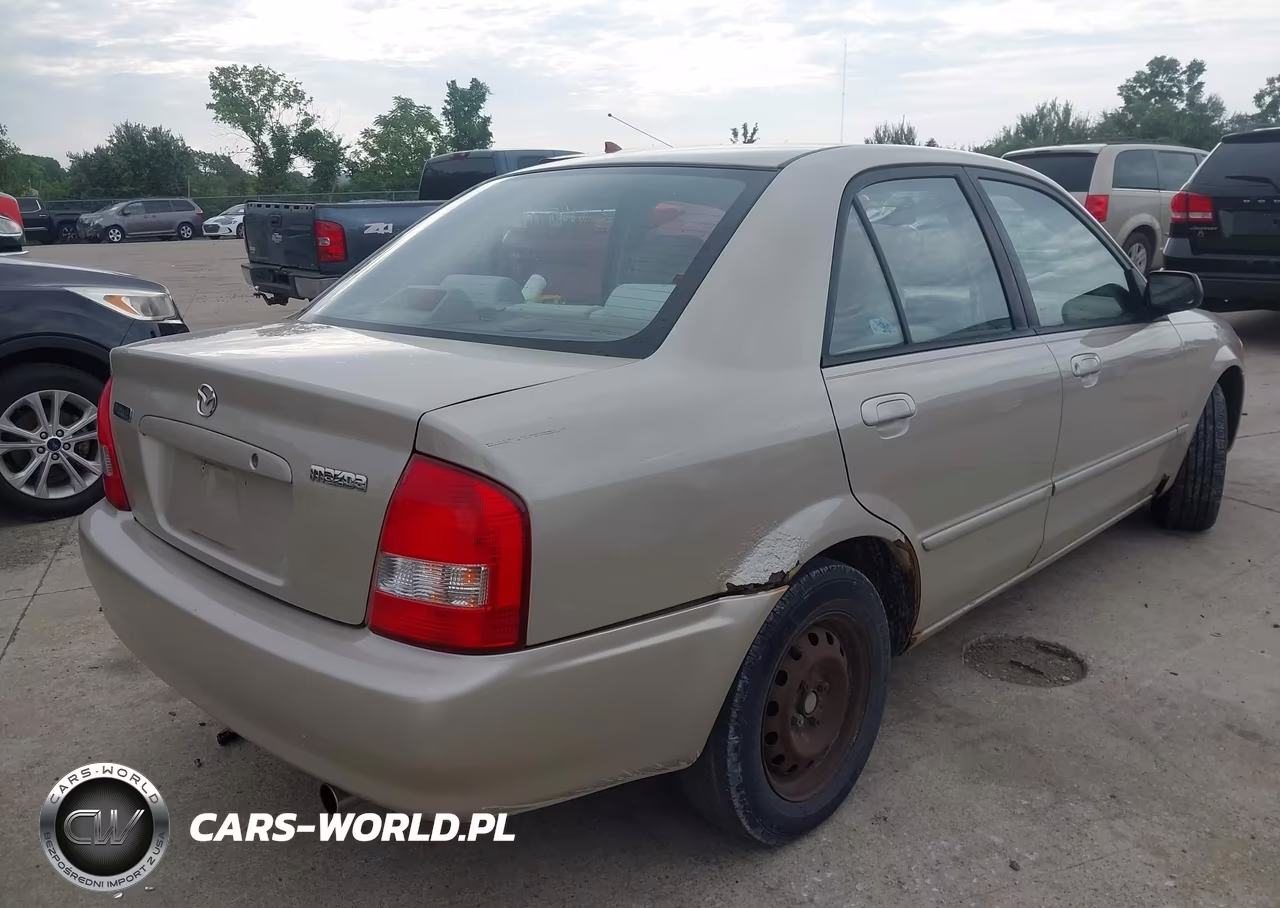 2000 Mazda Protege Dx-Lx VIN:JM1BJ222XY0294440 - 4