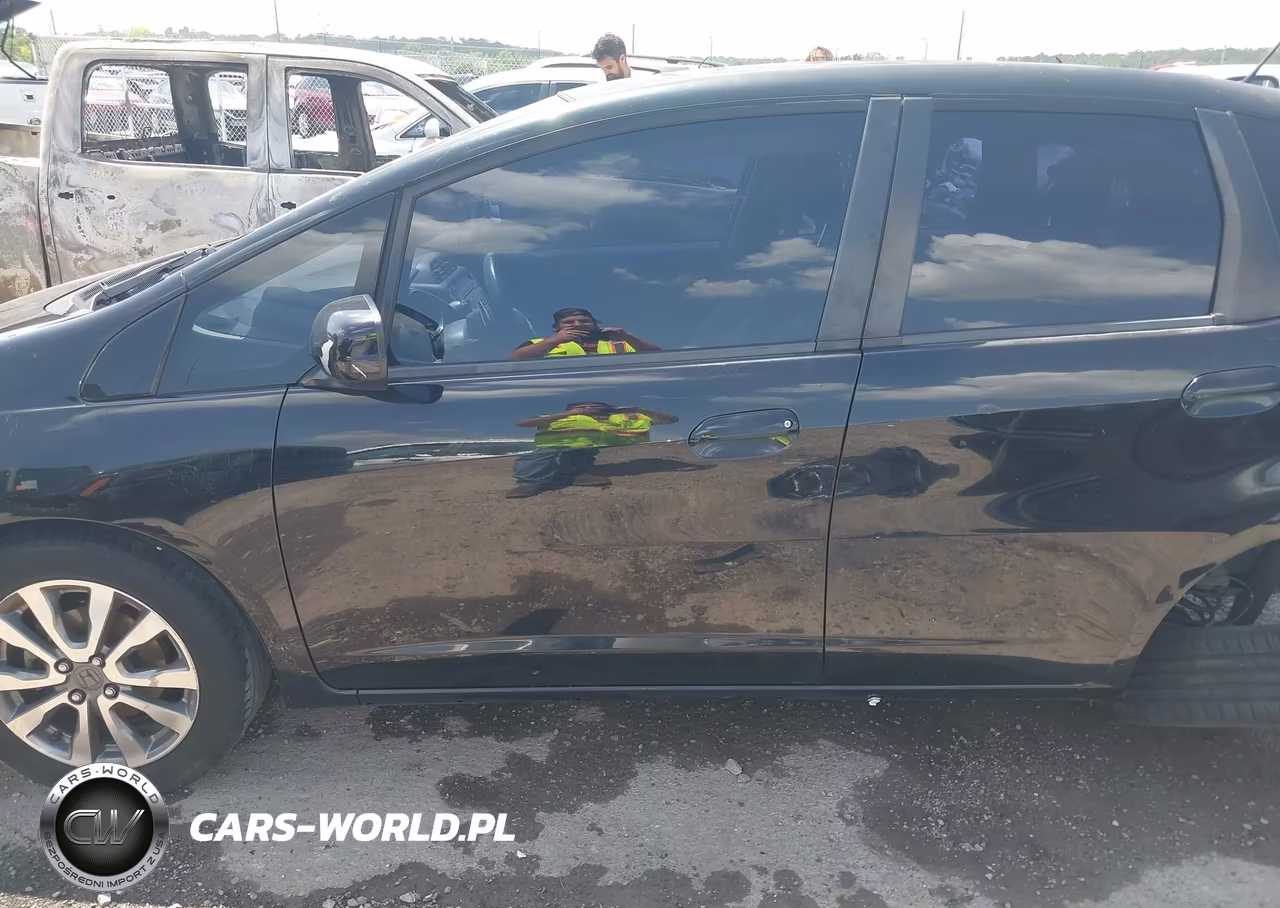 2012 Honda Fit Sport VIN:JHMGE8H50CC006011 - 14