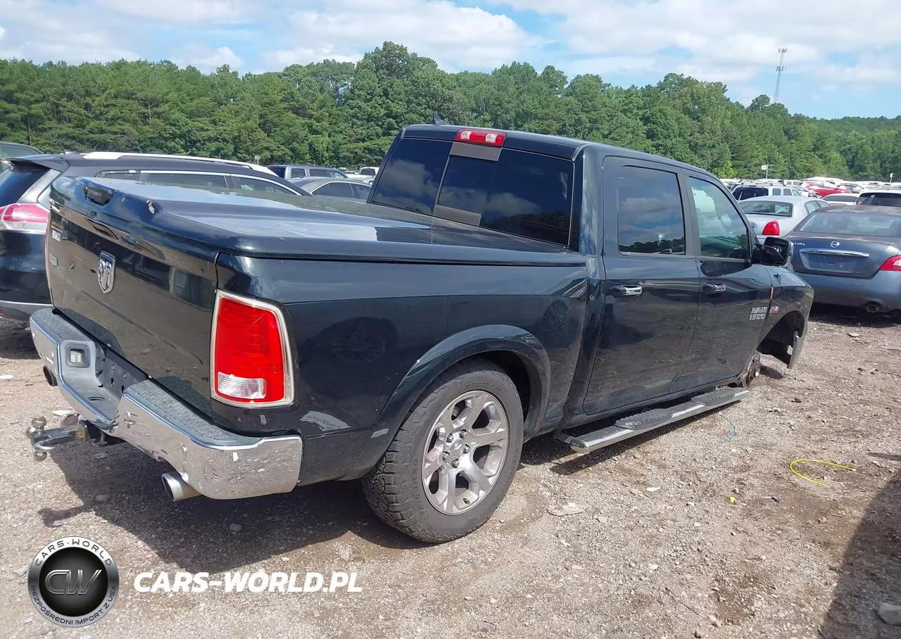2015 Ram 1500 Laramie VIN:1C6RR6NTXFS669321 - 4