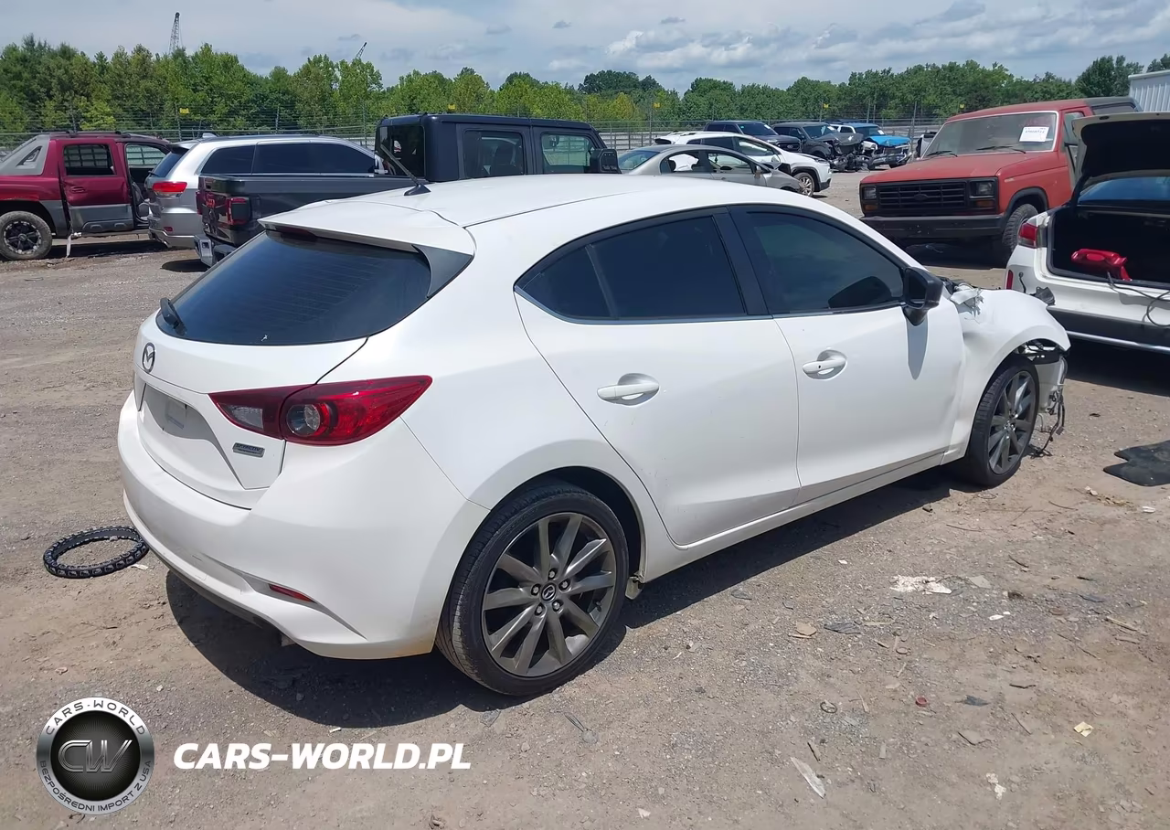 2018 Mazda Mazda3 Touring VIN:3MZBN1L32JM241415 - 4