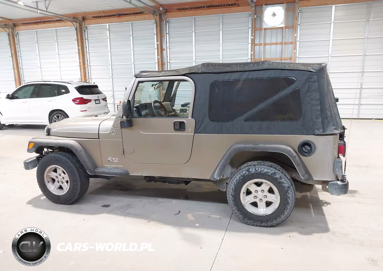 2005 Jeep Wrangler Unlimited VIN:1J4FA44S05P320034 - 14