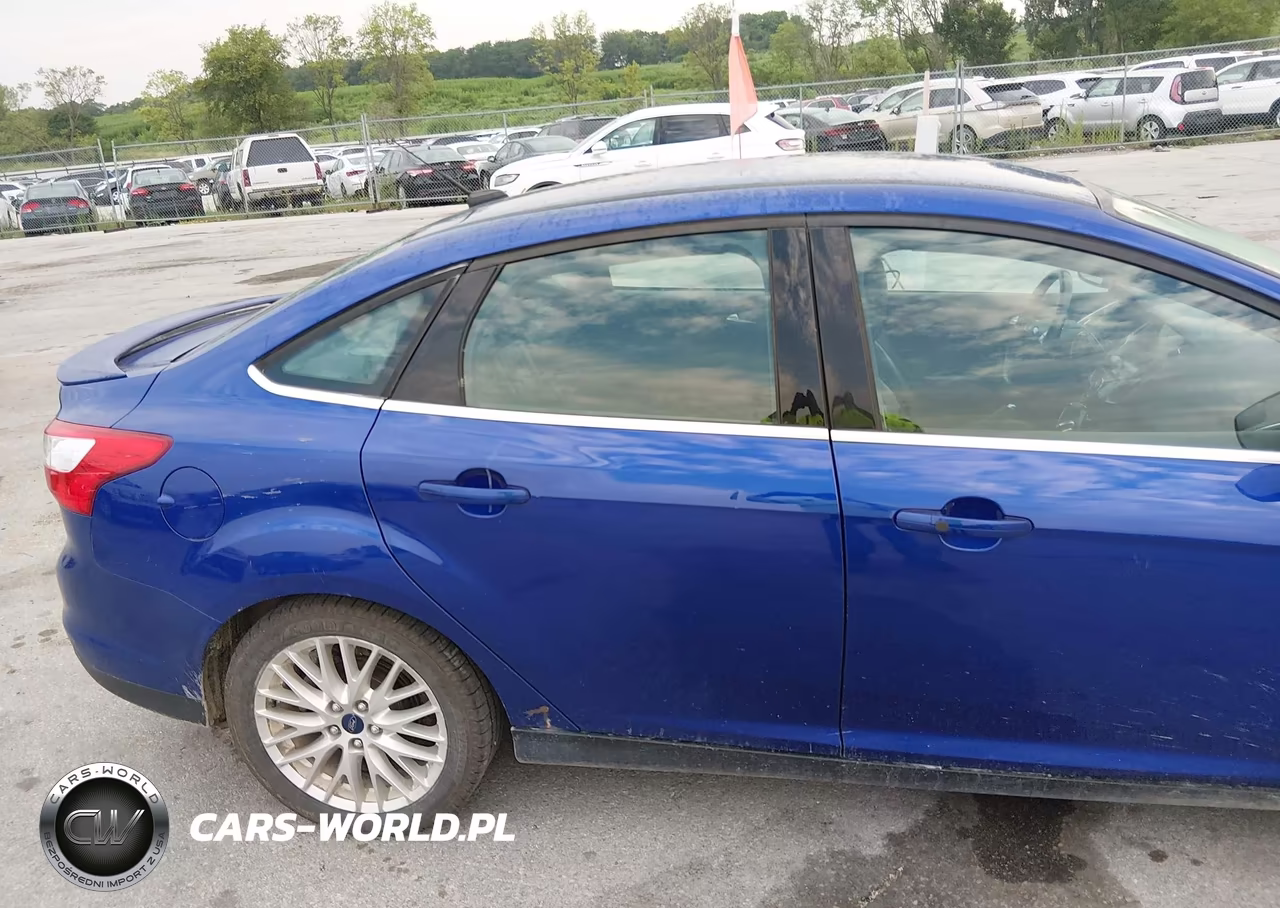 2014 Ford Focus Titanium VIN:1FADP3J22EL360753 - 12