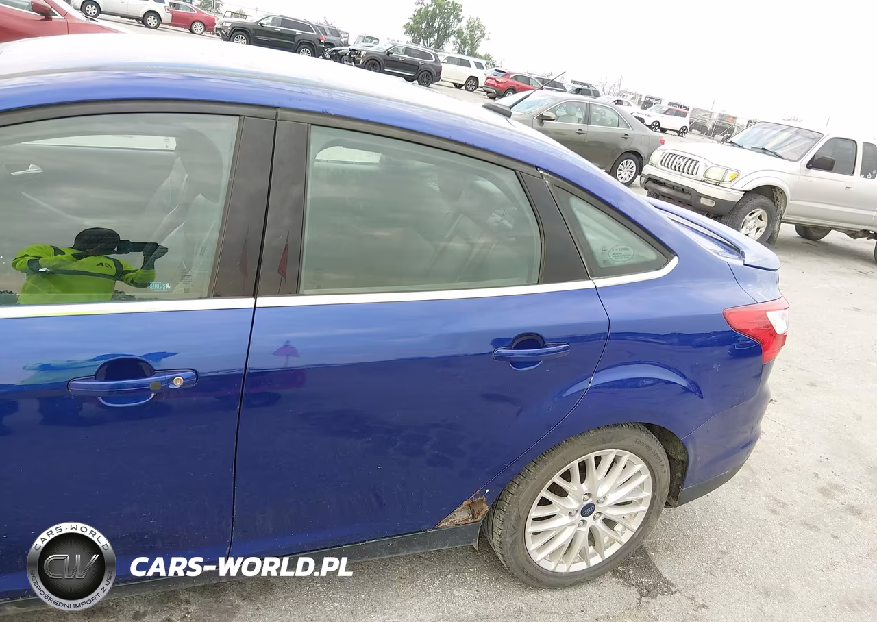 2014 Ford Focus Titanium VIN:1FADP3J22EL360753 - 14