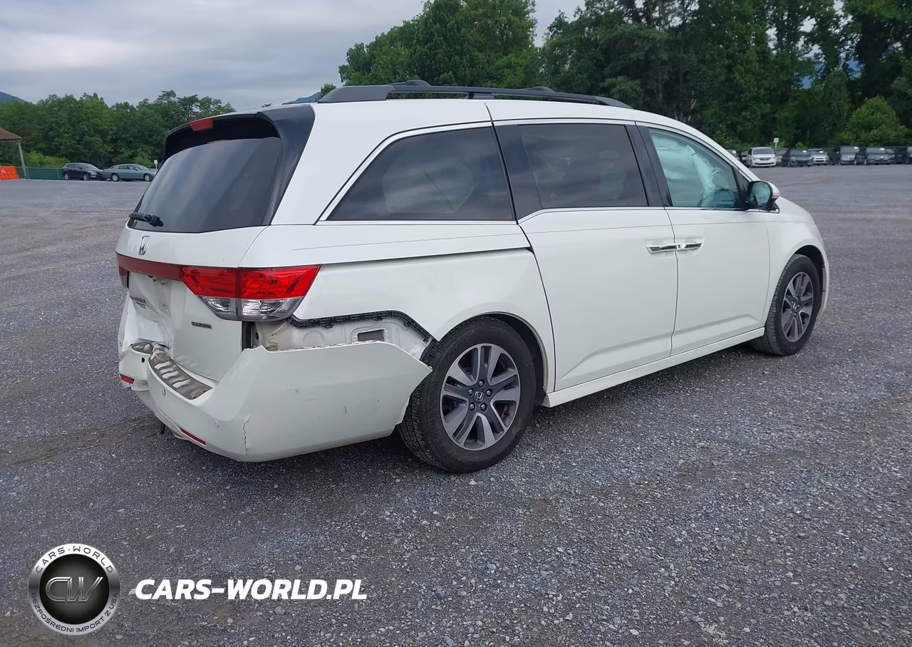 2016 Honda Odyssey Touring-Touring Elite VIN:5FNRL5H94GB008449 - 4
