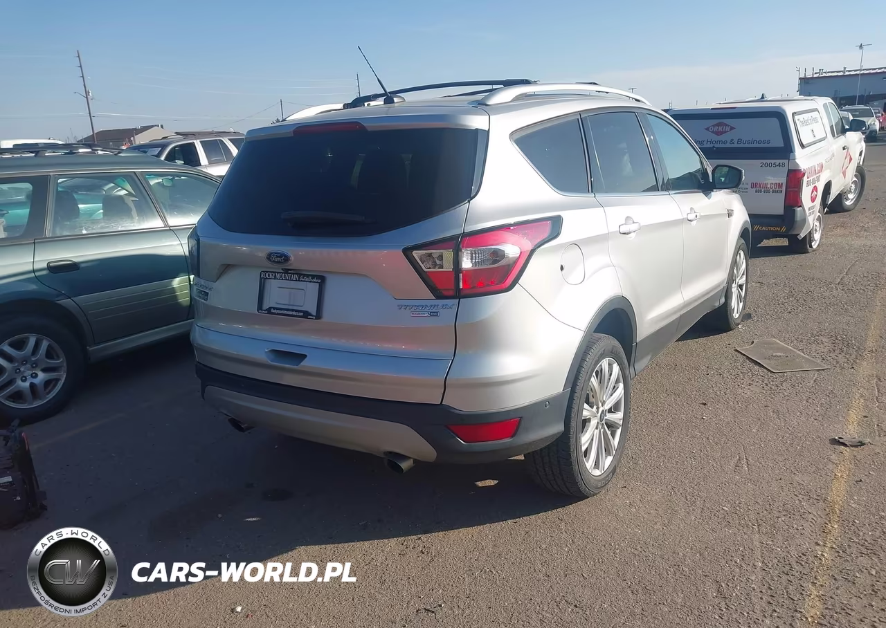 2017 Ford Escape Titanium VIN:1FMCU9J9XHUC66595 - 4