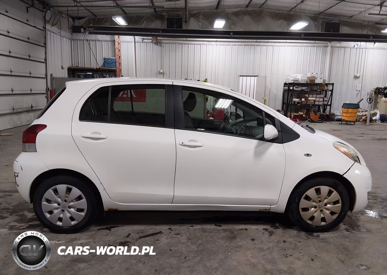 2009 Toyota Yaris VIN:JTDKT903895244672 - 13