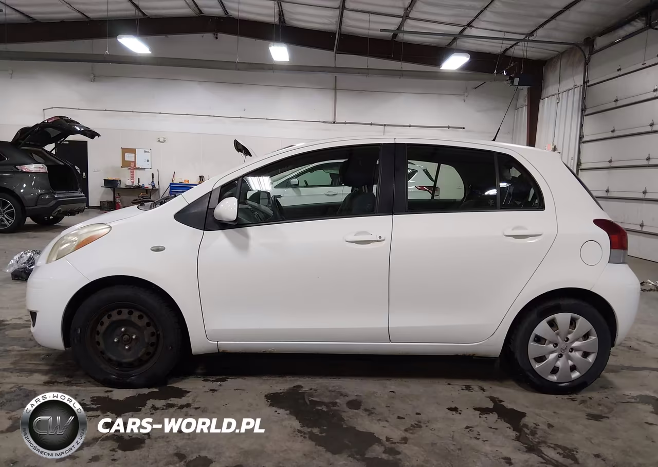 2009 Toyota Yaris VIN:JTDKT903895244672 - 14