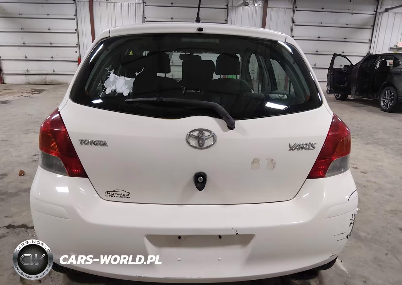2009 Toyota Yaris VIN:JTDKT903895244672 - 16