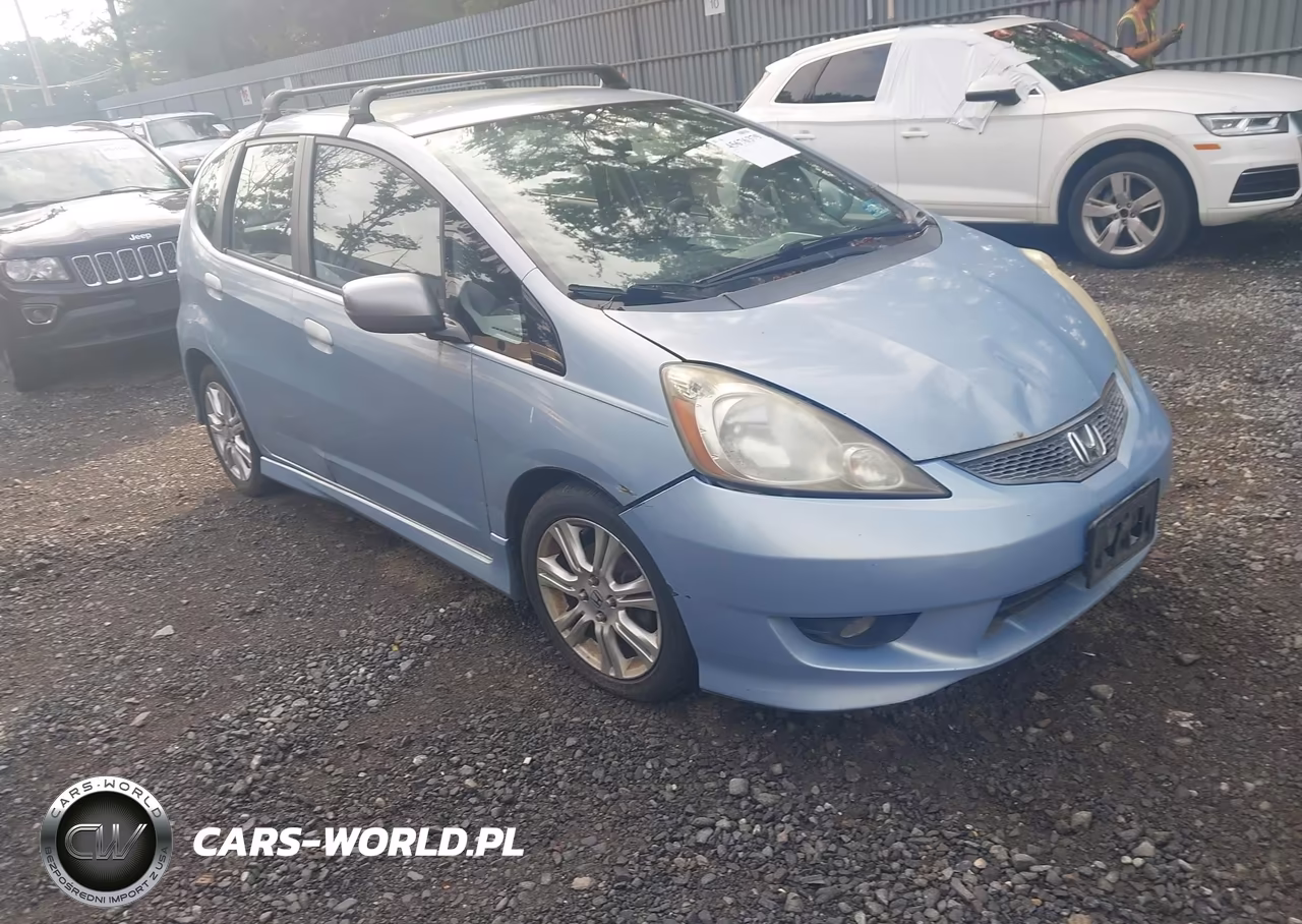 2009 Honda Fit Sport VIN:JHMGE88429S011880 - 1
