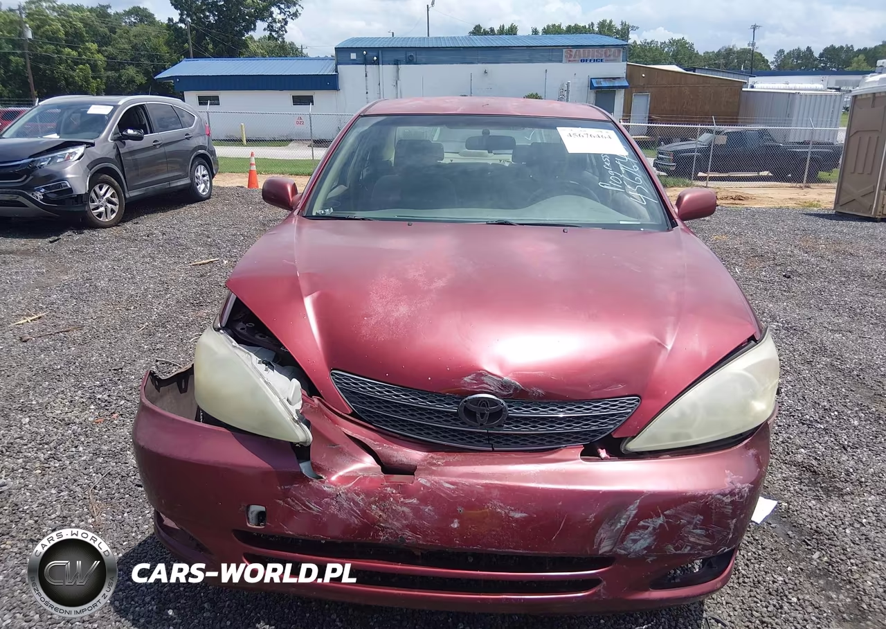 2002 Toyota Camry Le VIN:JTDBE32K620115084 - 13