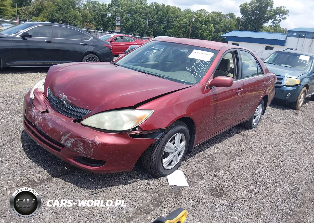 2002 Toyota Camry Le VIN:JTDBE32K620115084 - 2