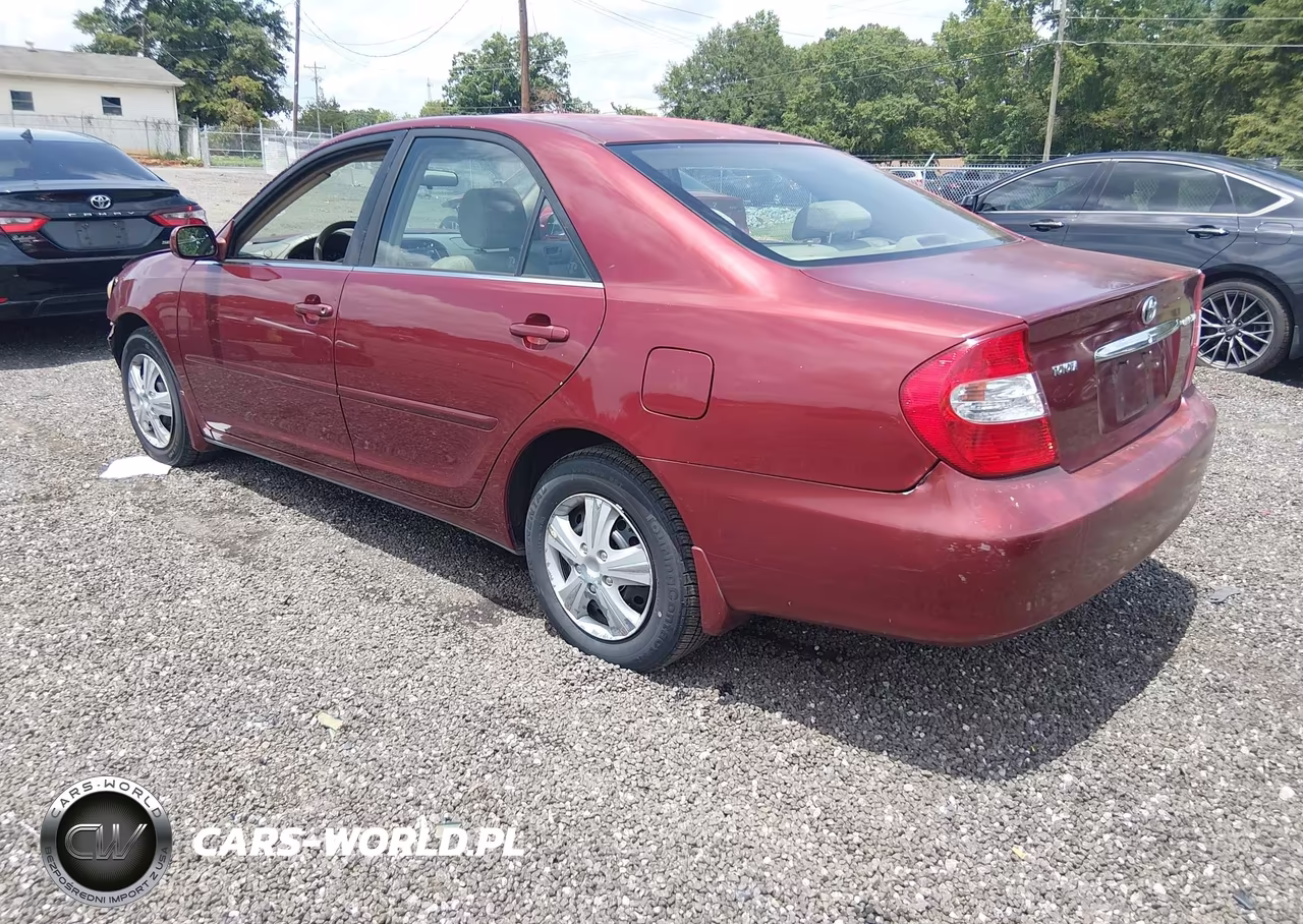 2002 Toyota Camry Le VIN:JTDBE32K620115084 - 3
