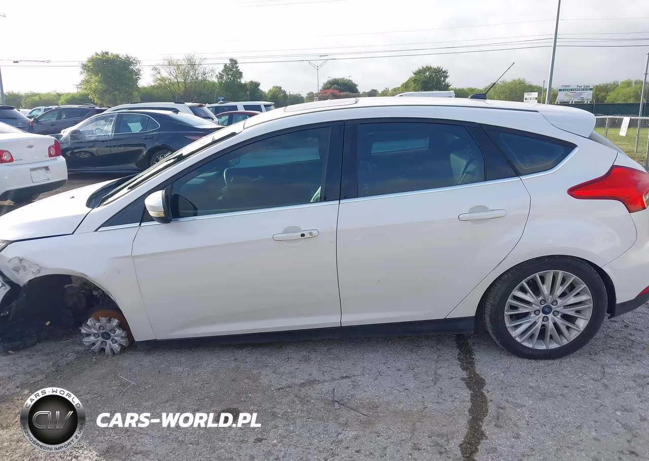 2017 Ford Focus Titanium VIN:1FADP3N2XHL299411 - 13