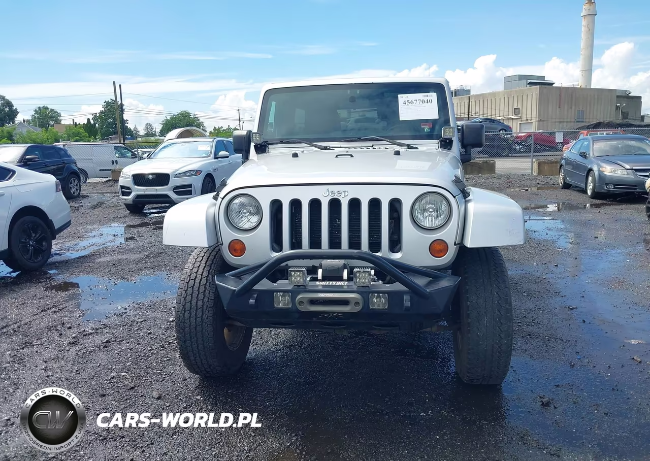 2012 Jeep Wrangler Unlimited Sahara VIN:1C4HJWEG4CL122470 - 12