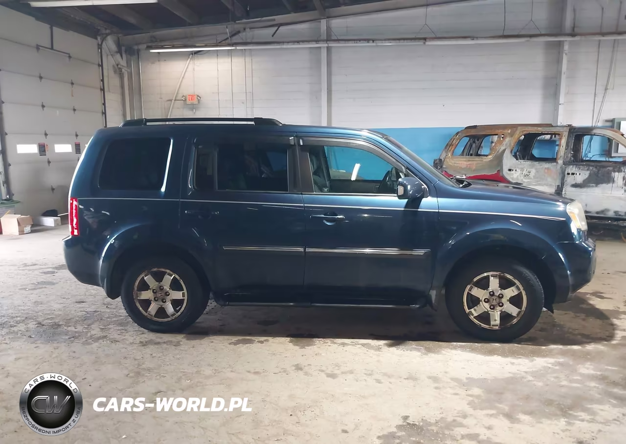 2010 Honda Pilot Touring VIN:5FNYF4H94AB006799 - 13