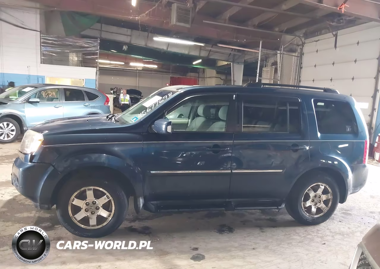 2010 Honda Pilot Touring VIN:5FNYF4H94AB006799 - 14